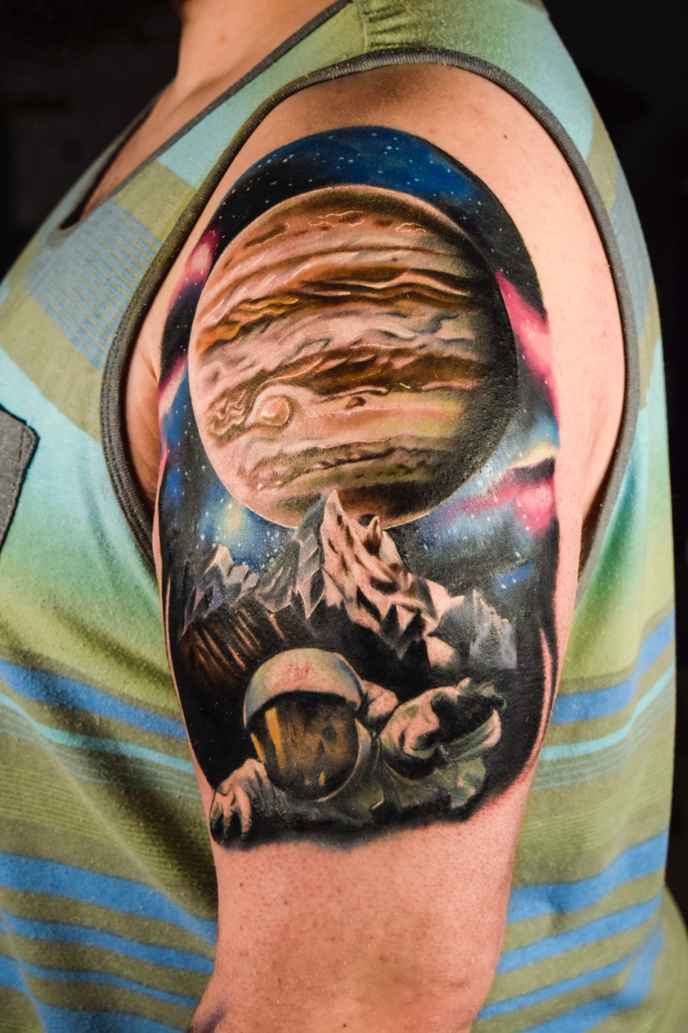 Color realism astronaut tattoo by All City Tattoo