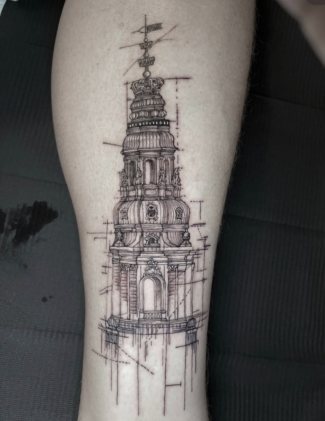 Delicate fine line tattoo created at All City Tattoo